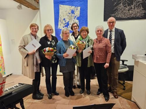 prizewinner with the mayor, museum staff and Nanna (photo_museum)